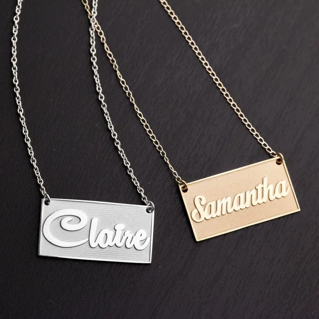 Sterling Silver Personalized Embossed Name Bar Pendant by JEWLR